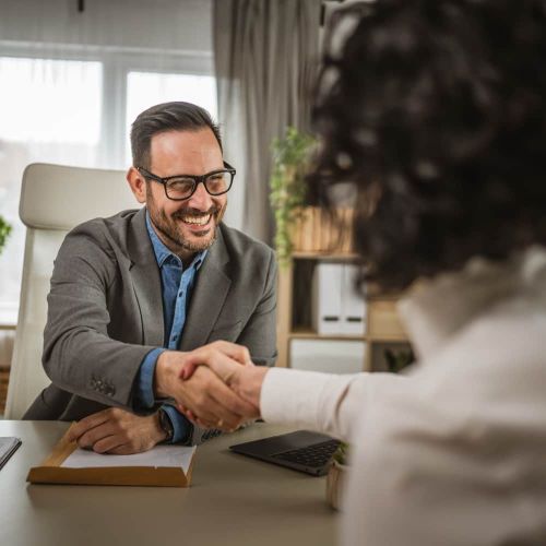 Shaking hands with customer